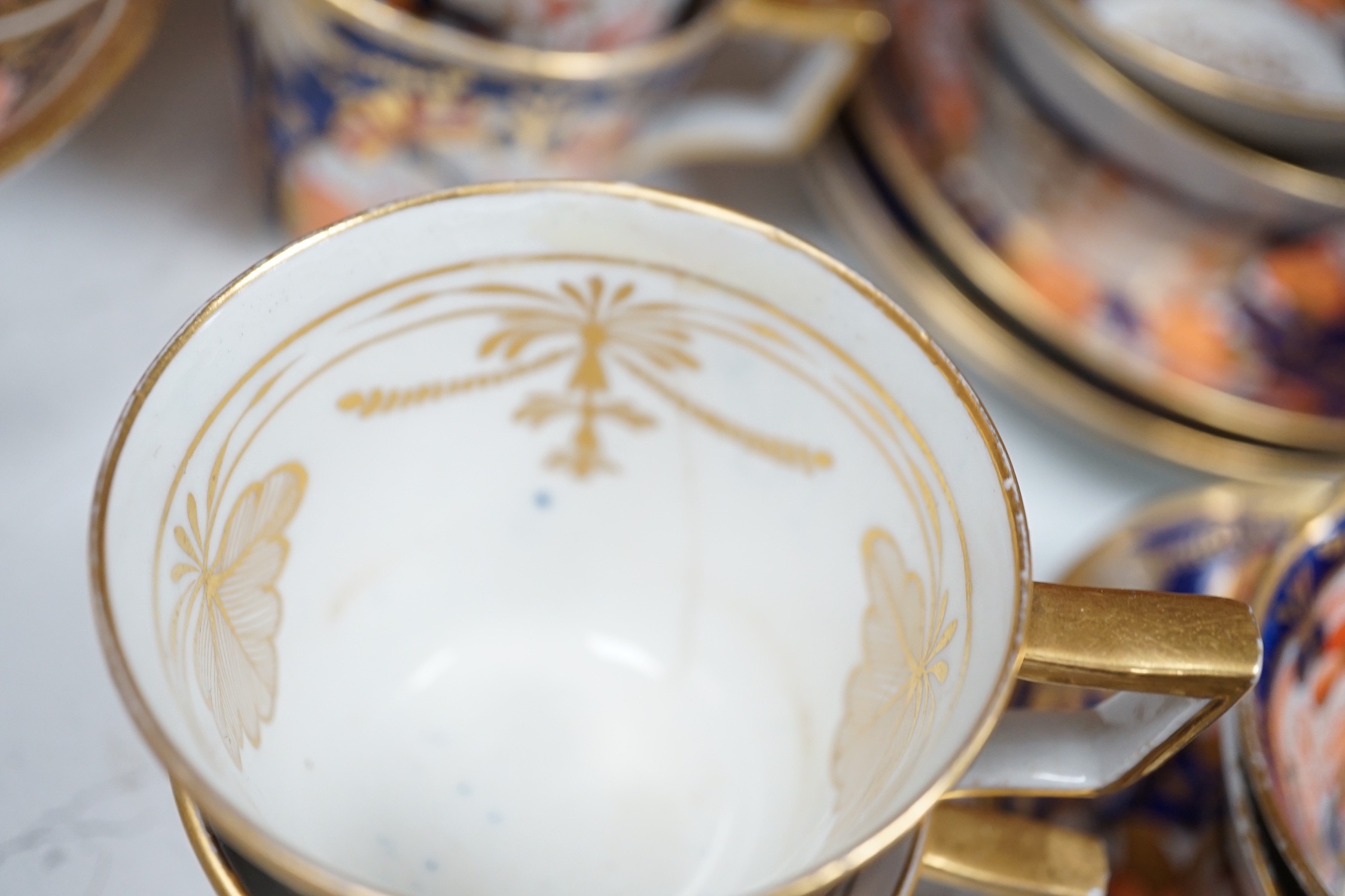 An early 19th century English porcelain Japan-pattern tea and coffee set and two similar dessert dishes